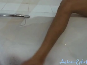 Young Asian twinks shower together and get turned on